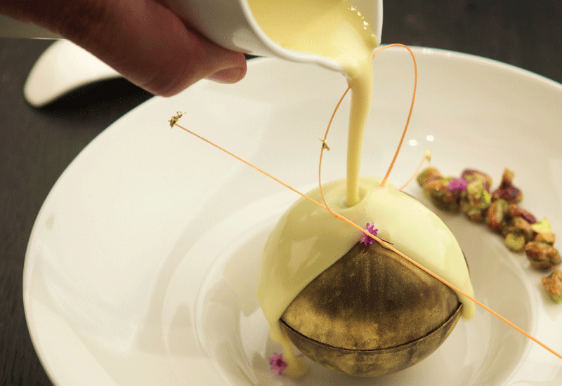 Chobab bread pudding with hot camel custard sauce. Chobab bread pudding with hot camel custard sauce.