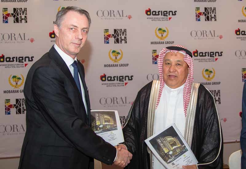 Laurent A. Voivenel, CEO of HMH – Hospitality Management Holdings and Al Sheikh Mohamed Ebrahim Abdulrahim, owner of Mobarak Hotels Group signing the agreement for Coral Al Madina Hotel in Madina, KSA. Laurent A. Voivenel, CEO of HMH – Hospitality Management Holdings and Al Sheikh Mohamed Ebrahim Abdulrahim, owner of Mobarak Hotels Group signing the agreement for Coral Al Madina Hotel in Madina, KSA.