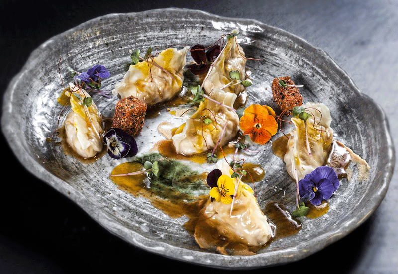 Corn-fed chicken gyoza. Corn-fed chicken gyoza.
