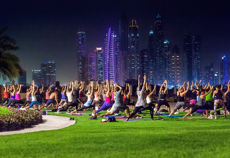 Fairmont The Palm offers full moon beach yoga classes. Fairmont The Palm offers full moon beach yoga classes.