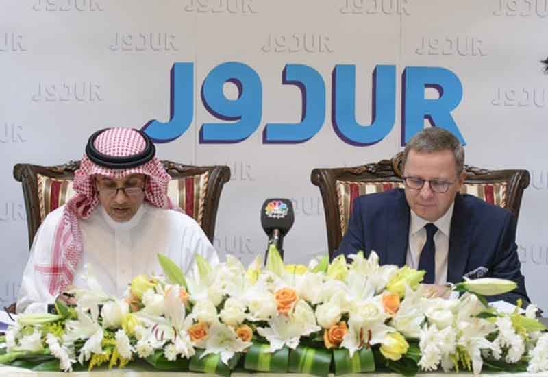 Pascal Gauvin and Abdullah Bin Mohammed Al Issa sign the management agreement. Pascal Gauvin and Abdullah Bin Mohammed Al Issa sign the management agreement.