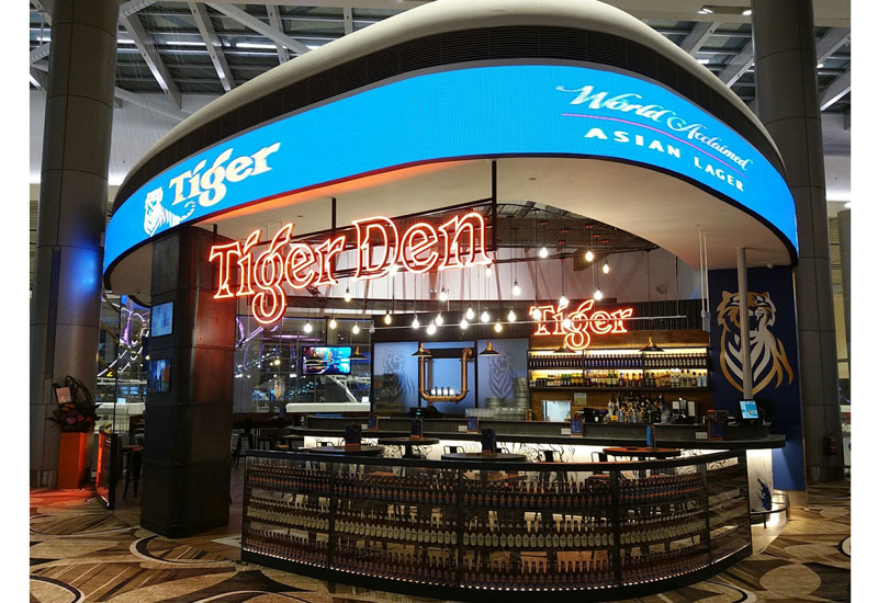 Tiger Den at the new Terminal 4 in Singapore's Changi Airport. Tiger Den at the new Terminal 4 in Singapore's Changi Airport.
