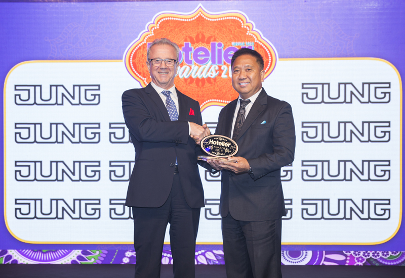 Butch Lim receives the Hotel Engineer of the Year awards from Jung's Tark Zakaria. Butch Lim receives the Hotel Engineer of the Year awards from Jung's Tark Zakaria.