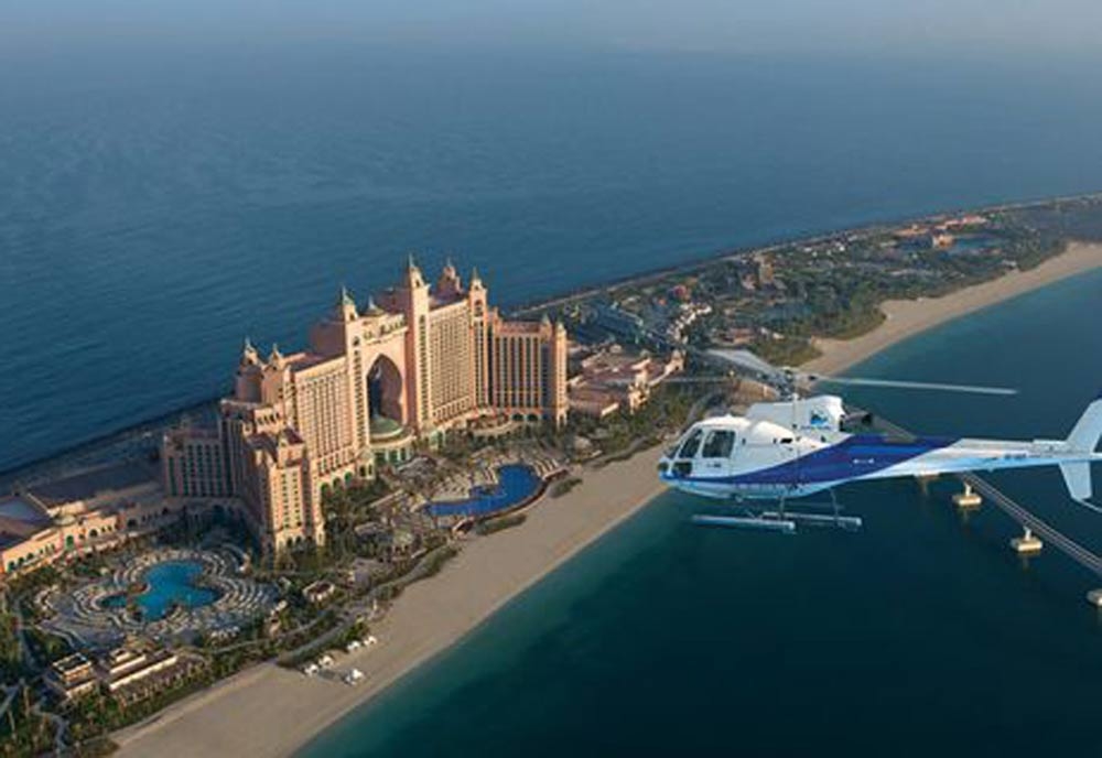 The Alpha Tours helicopter is thought to have crashed during take-off in the parking lot of the Atlantis Palm hotel. The Alpha Tours helicopter is thought to have crashed during take-off in the parking lot of the Atlantis Palm hotel.