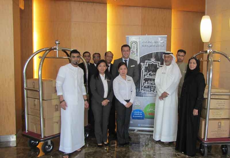 Hotel staff with donations collected during the campaign. Hotel staff with donations collected during the campaign.