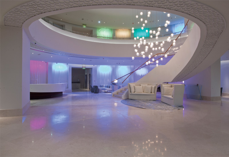 The lobby's light up walls allow for different moods to be created. The lobby's light up walls allow for different moods to be created.