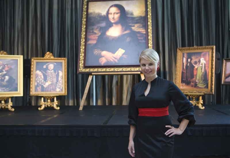 Nestle Professional's Mary-Ann Gardner, in front of the humorous replicas of Louvre paintings incorporating Maggi chicken bouillon. Nestle Professional's Mary-Ann Gardner, in front of the humorous replicas of Louvre paintings incorporating Maggi chicken bouillon.