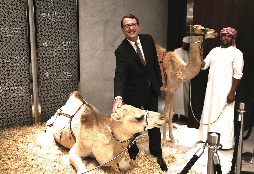 Camels welcome guests at the entrance to the pre-function area at Pullman Hotel, Dubai City Centre. Camels welcome guests at the entrance to the pre-function area at Pullman Hotel, Dubai City Centre.