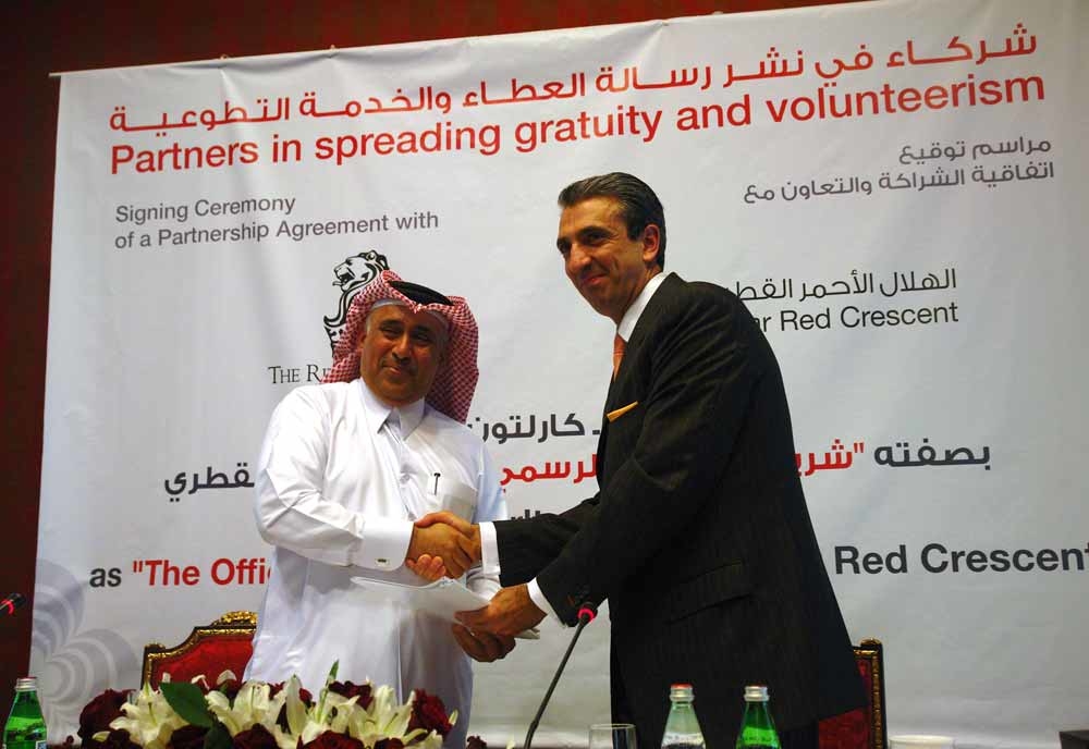 Secretary general of Qatar Red Crescent Saleh Al-Mahanadi and Ritz-Carlton, Doha general manager Hoss Vetry celebrate their official partnership. Secretary general of Qatar Red Crescent Saleh Al-Mahanadi and Ritz-Carlton, Doha general manager Hoss Vetry celebrate their official partnership.