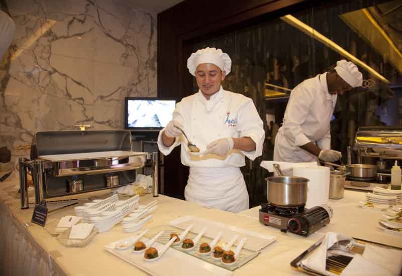 Chefs serve up gourmet appetisers at the show. Chefs serve up gourmet appetisers at the show.