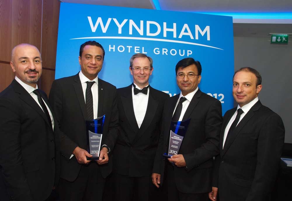 Wyndham Grand Regency Doha's management team celebrate their award win. Wyndham Grand Regency Doha's management team celebrate their award win.