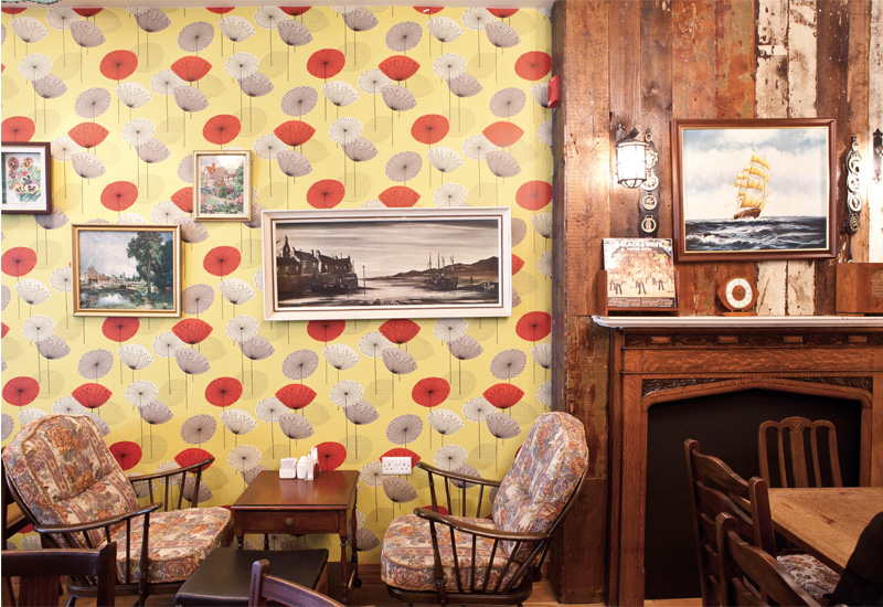 The popular Poppy wallpaper by Sanderson and a fireplace obtained from Cefn Coed Hospital in Swansea. The popular Poppy wallpaper by Sanderson and a fireplace obtained from Cefn Coed Hospital in Swansea.