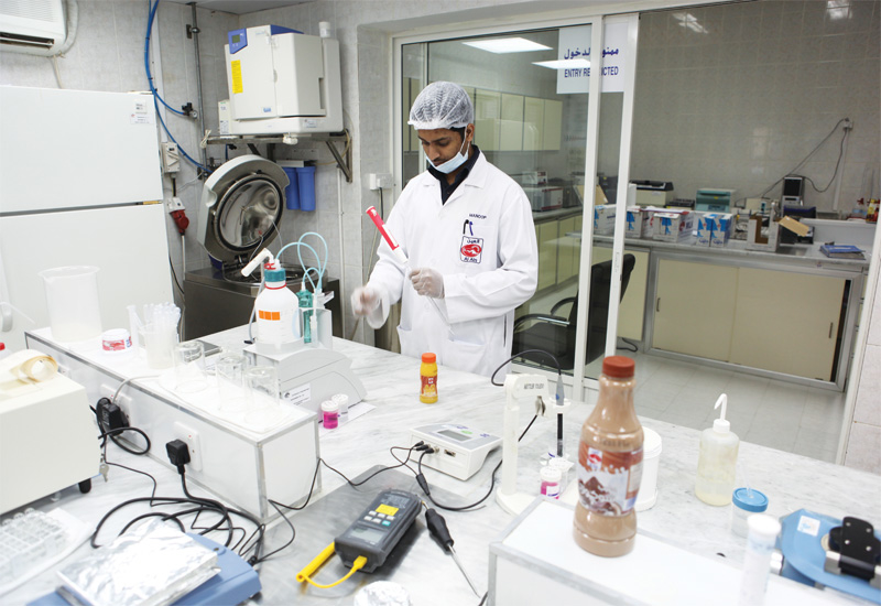 Al Ain Dairy factory quality control lab. Al Ain Dairy factory quality control lab.