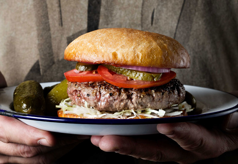 DIG INTO: 200g Angus rump burger. DIG INTO: 200g Angus rump burger.