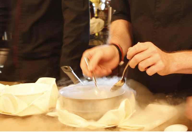 Sorbet is dropped into liquid nitrogen to create a gin/tonic nitro. Sorbet is dropped into liquid nitrogen to create a gin/tonic nitro.