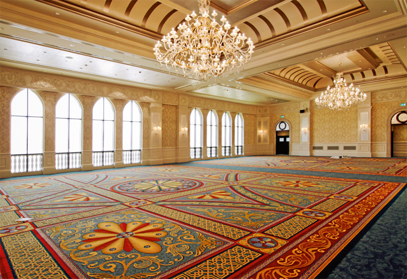 The vaulted ceilings, sparkling chandeliers and traditional, bright carpets create a grand ballroom at Ritz-Carlton Abu Dhabi, that can be used in its entirety or separated into three. The vaulted ceilings, sparkling chandeliers and traditional, bright carpets create a grand ballroom at Ritz-Carlton Abu Dhabi, that can be used in its entirety or separated into three.