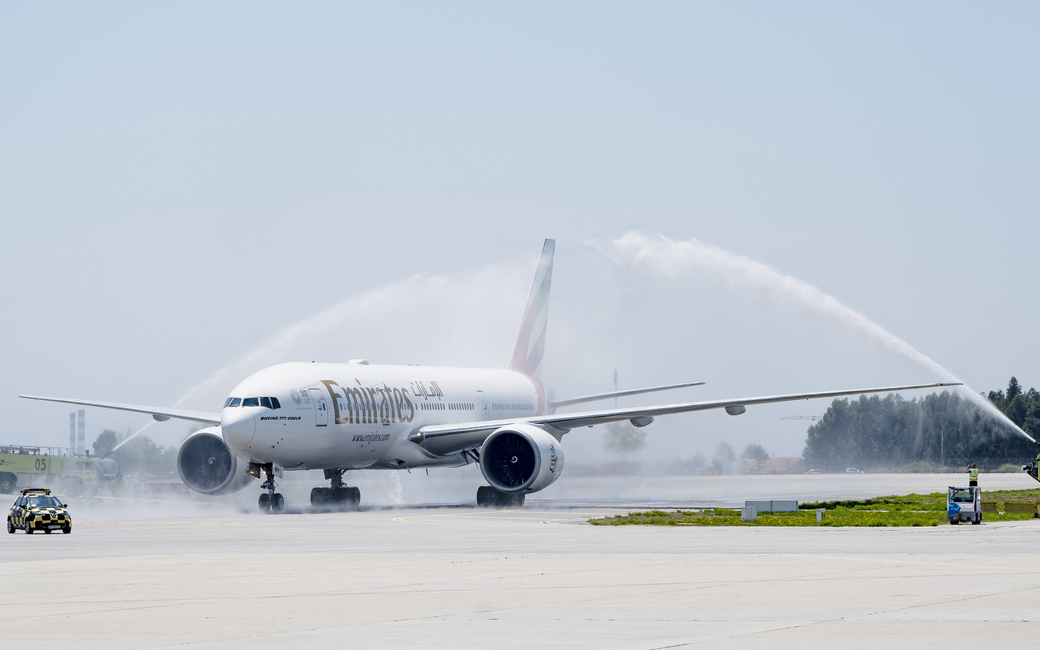 Emirates Boeing 777300ER is welcomed with a water cannon salute after touchdown at Porto Airport. Emirates Boeing 777300ER is welcomed with a water cannon salute after touchdown at Porto Airport.