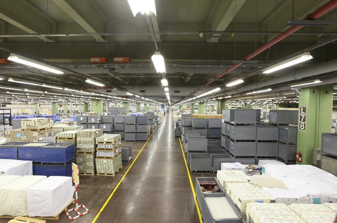 Copies of the Holy Qur'an are prepared for shipping at the King Fahad Complex Copies of the Holy Qur'an are prepared for shipping at the King Fahad Complex