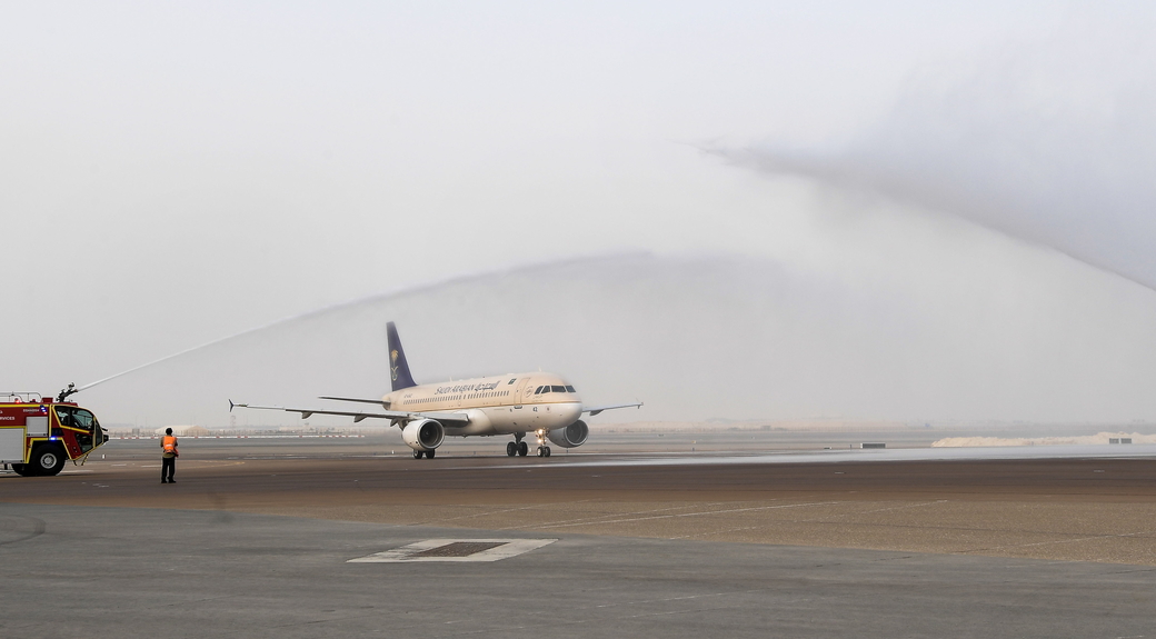 The flight, an Airbus A320 operated by Saudia, was greeted by a customary water cannon salute. The flight, an Airbus A320 operated by Saudia, was greeted by a customary water cannon salute.