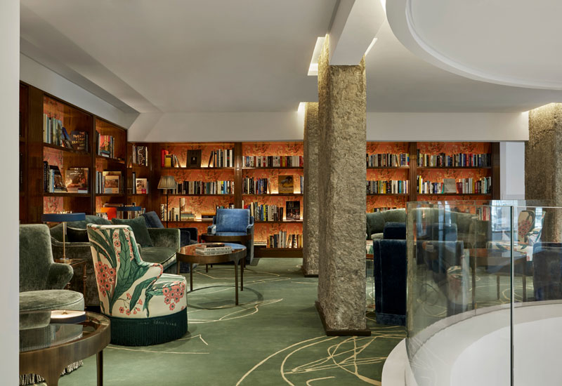 Tea is served at the boutique’s library, a mezzanine overlooking the lobby Tea is served at the boutique’s library, a mezzanine overlooking the lobby
