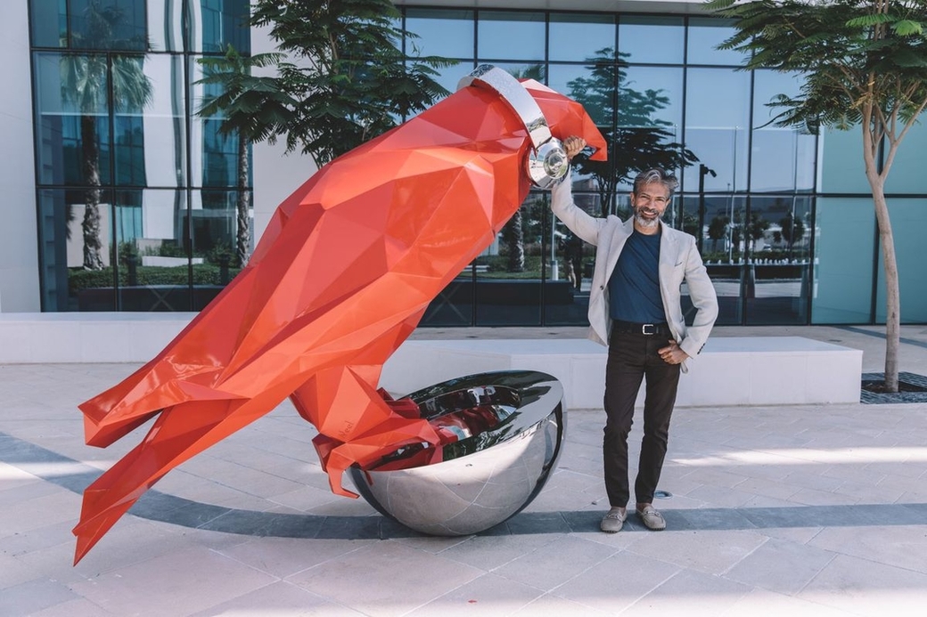 Neel Shukla and his falcon sculpture at the region's first Radisson RED hotel in Dubai Neel Shukla and his falcon sculpture at the region's first Radisson RED hotel in Dubai